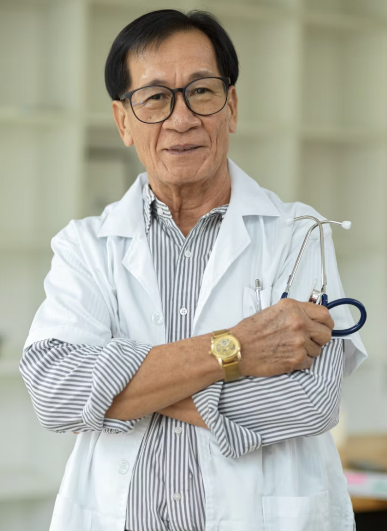 Senior male doctor with white coat and stethoscope